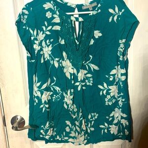 Floral green sleeveless shirt